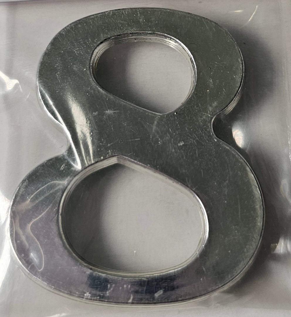 Silver Plastic #8 Embellishment