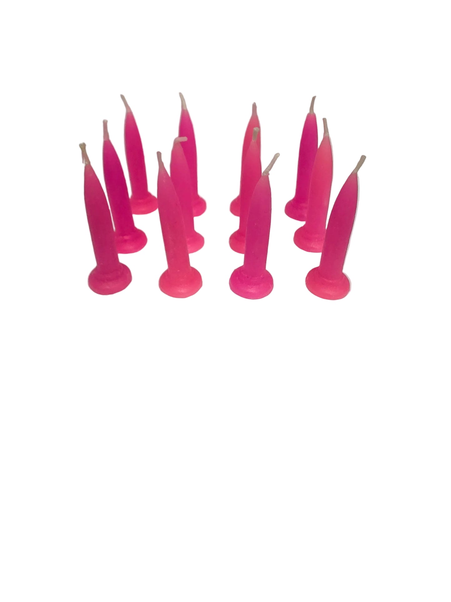 “Packet of 12 Hot Pink bullet candles arranged upright, bold colour suitable for birthday cakes.