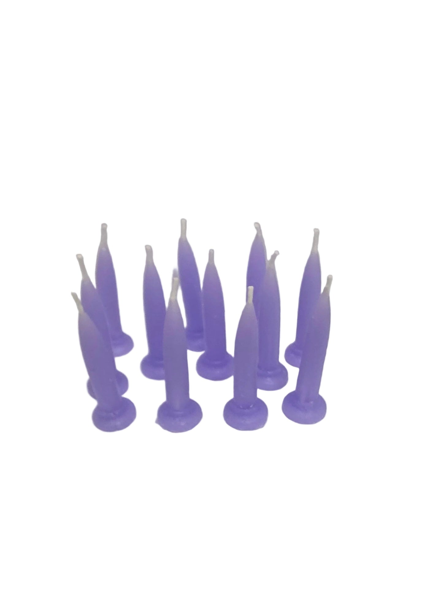 Packet of 12 lavender bullet candles arranged upright, soft pastel colour suitable for birthday cakes.
