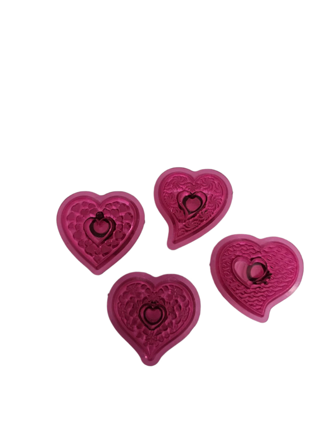Fantasy Hearts JEM Set 4 showing four small heart‑shaped cutters, each approximately 4cm, designed for creating fondant or gum‑paste decorations for cakes and cupcakes.