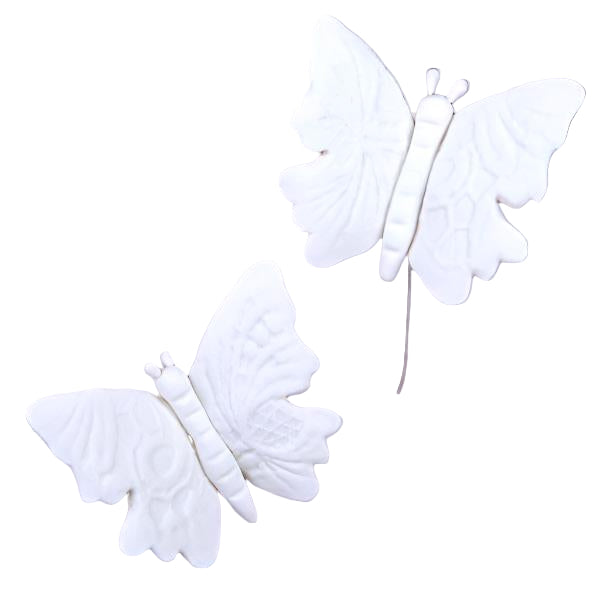 Two white embossed wired butterflies designed for cake or cupcake decoration.