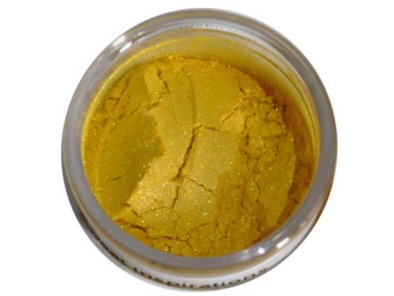 A small container of yellow lustre dust, used for adding color and sparkle to edible decorations.