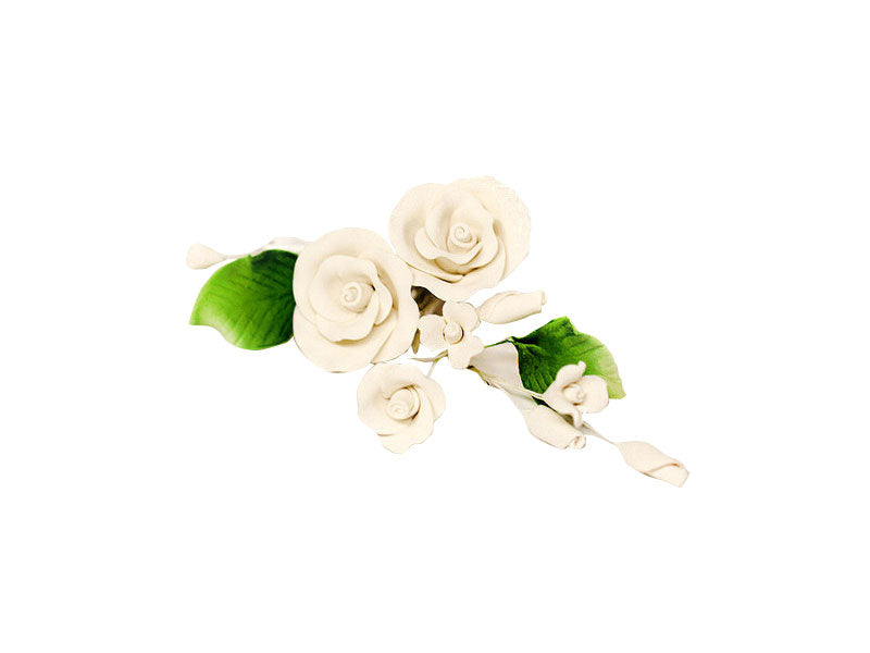 An ivory-colored, medium-sized rose spray with green leaves, made from gum paste, designed for cake decoration.