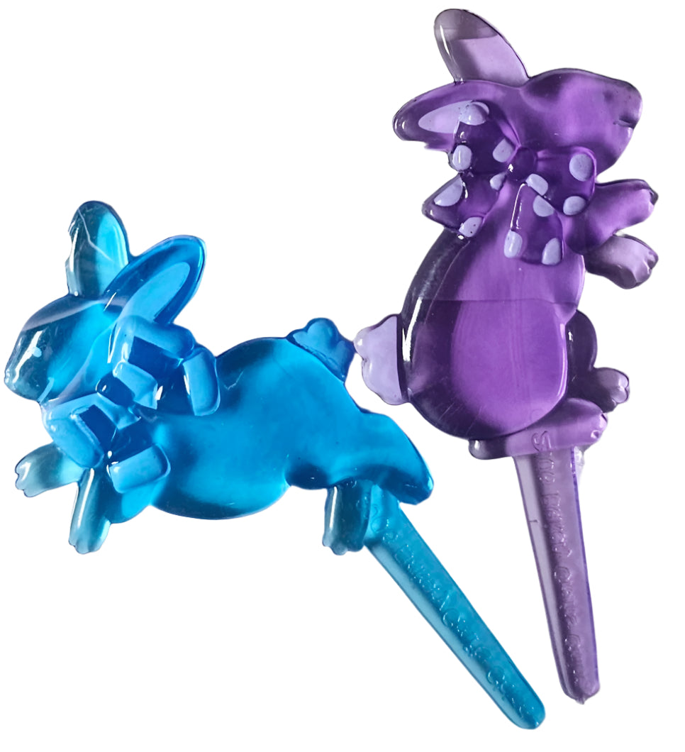 Bunny plastic embellishment on spike for easy insert into cake or cupcake.