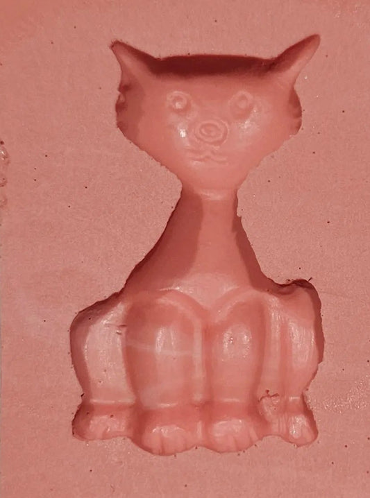Small cat-shaped silicone mould with detailed cavities for fondant, chocolate and cake decorating.