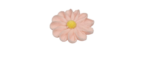 Pink flower-shaped object with a yellow center on a white background