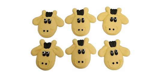 Six yellow giraffe-shaped cookies on a white background