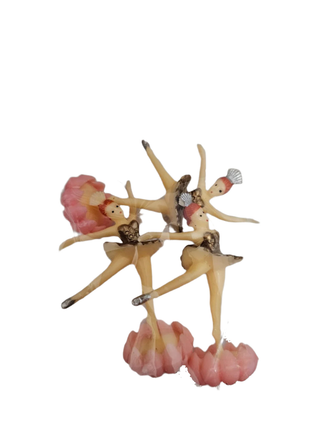 Decorative figurines of ballerinas on a stand with 'The Sugar Smith' branding in the background.