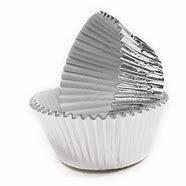 Stack of mini silver foil cupcake cases with a 3cm base, used for baking small cupcakes and treats.