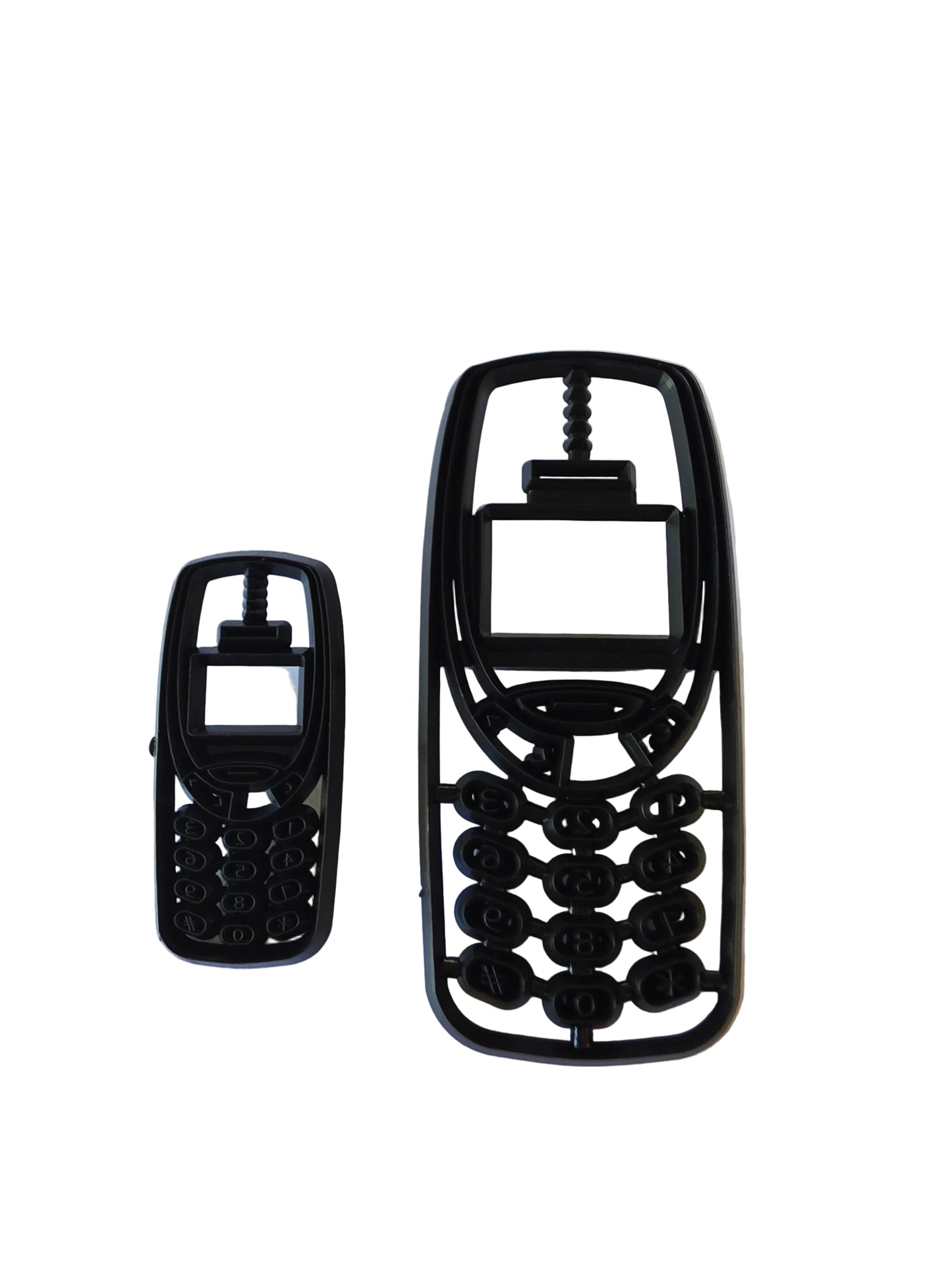 Patchwork Cutters Mobile Phone set by Marion Frost, two phone cutters with arrow, number, hashtag and star button details.