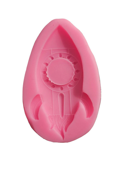 Silicone mould with a tall rocket‑shaped cavity for fondant, chocolate and space‑themed cake decorations