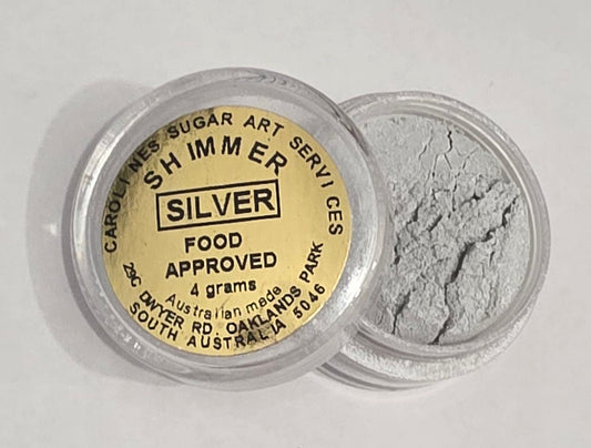 Small 4g pot of Caroline’s Silver Shimmer Dust with a bright metallic silver finish, used to add edible shimmer to cakes and fondant decorations.