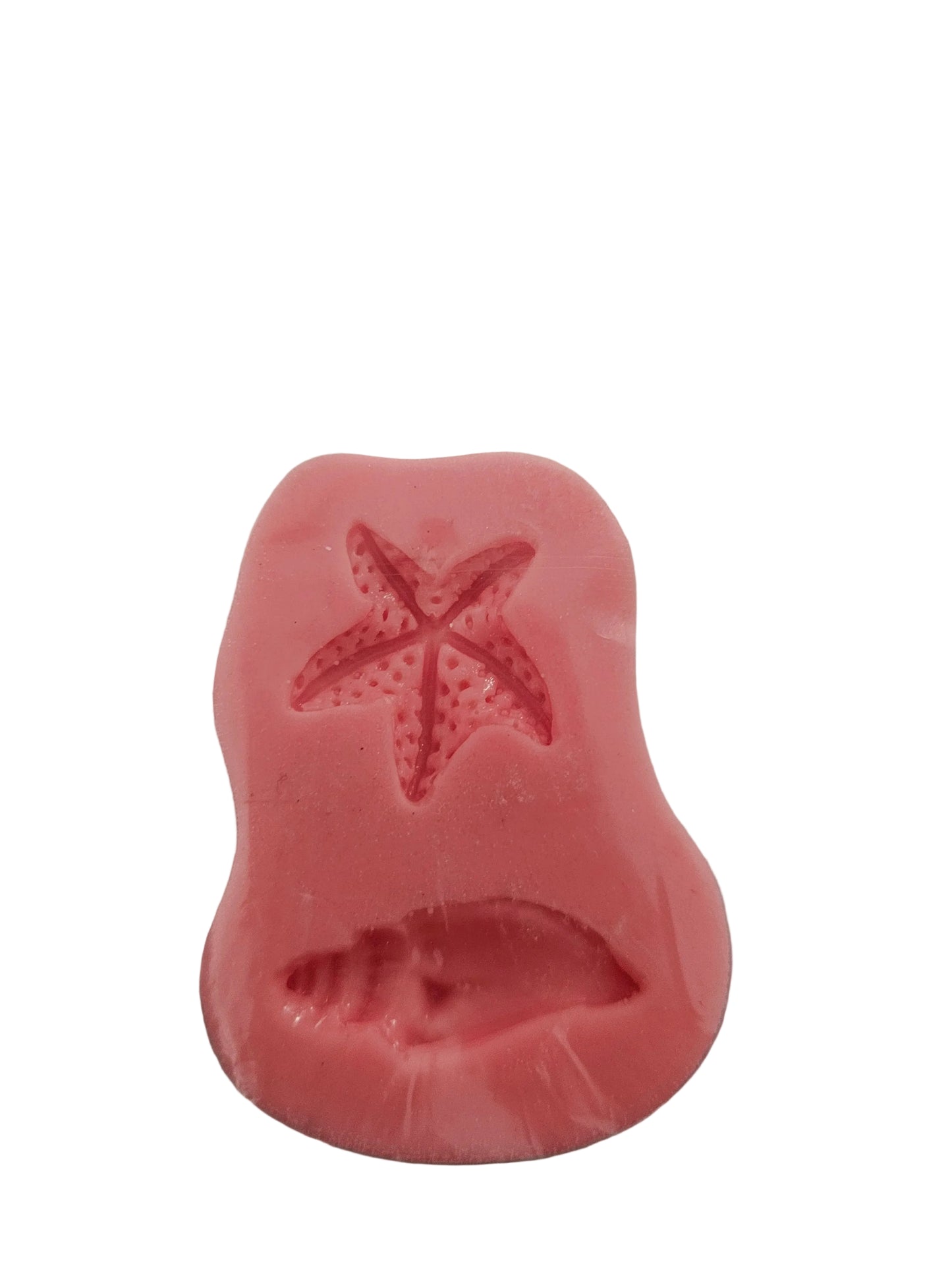 Silicone mould featuring small starfish and shell cavities for fondant, chocolate and ocean‑themed cake decorations