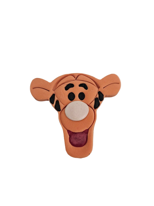 Cartoon character Tigger made out of fondant, great size for cakes and cupcakes.