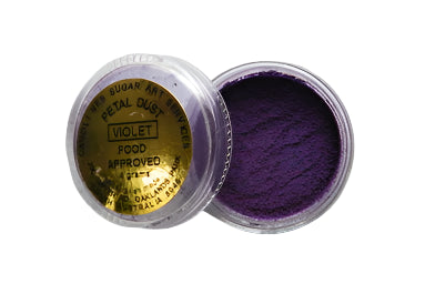A small container of violet petal dust, with the brand 'Sugar Art' labeled on the top, indicating it is edible and non-toxic for cake decorating.
