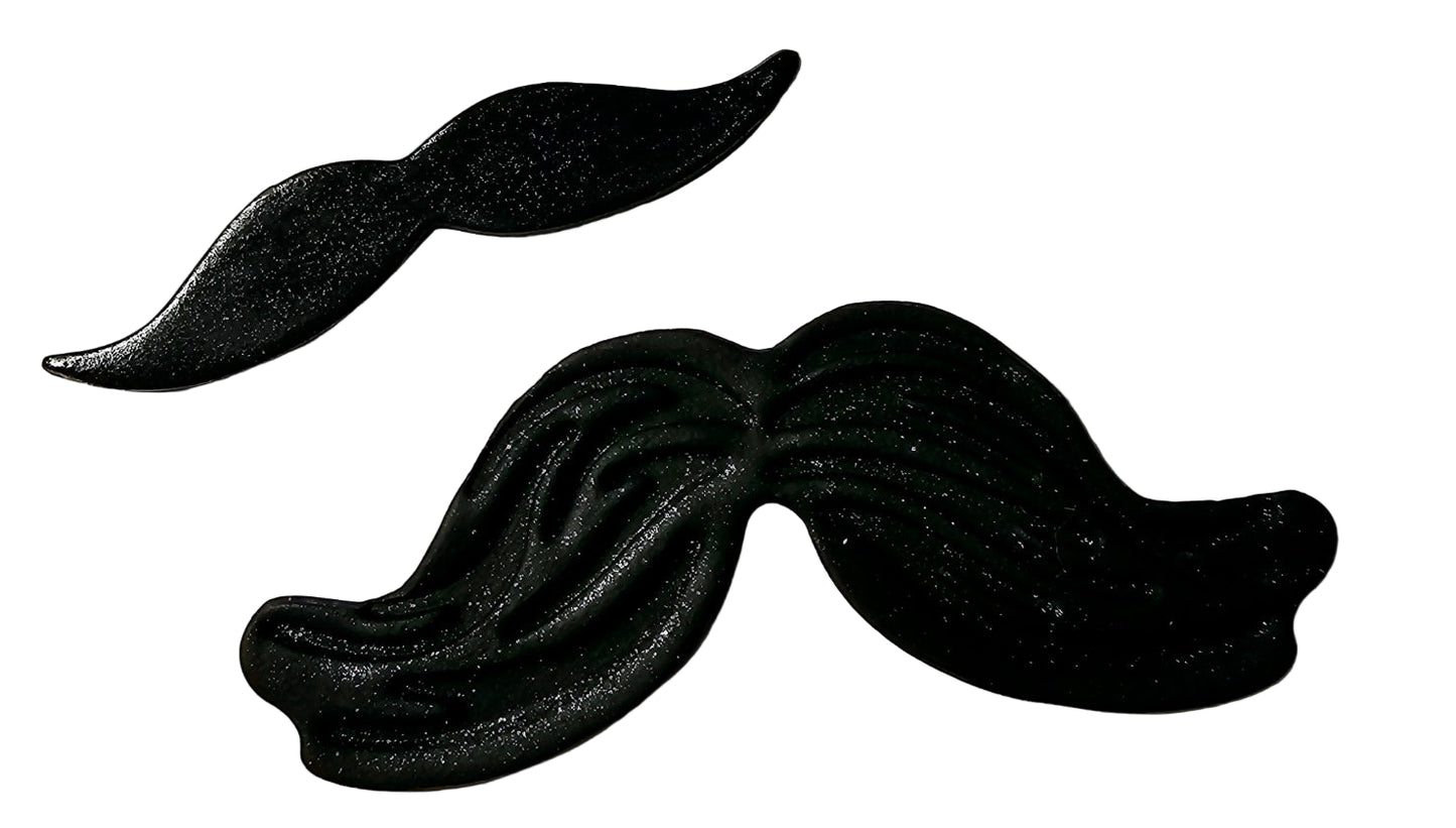 Two black icing moustache decorations, one large and one small, with a shiny and glazed finish respectively, on a white background.