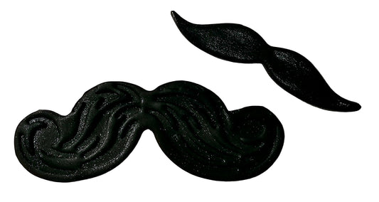Two black icing moustache decorations, one large and one small, with a shiny and glazed finish, respectively, on a white background.