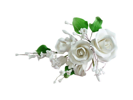 A beautiful large wired white spray made out of gum paste.
Consists of white roses, filler flowers and leaves, can be dusted with colour or add in ribbon to marry it into your colours.
APPROX. SIZE: 10 x 18cm