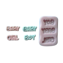 Silicone moulds in the shapes of text 'Baby Girl' and 'Baby Boy'.