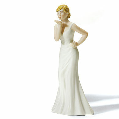 Hand‑painted porcelain bride blowing a kiss cake topper, 12.3cm tall.