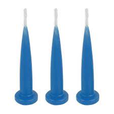 Packet of 12 royal blue bullet candles arranged upright, bold colour suitable for birthday cakes.