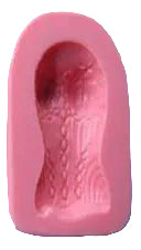 A silicone mould in the shape of a corset,intended for making edible decorations.