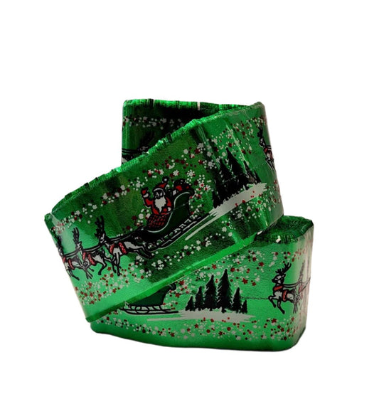 “Green Christmas cake frill with Santa in sleigh and reindeer, sold per metre.”

“Festive cake ribbon featuring Santa and sleigh design, 3.5″ high.”

“Christmas frill for decorating cakes, gateaux, and tortes with Santa sleigh motif.”