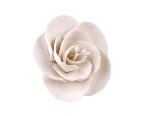 Small ivory dog rose sugar paste flower with central stamen, perfect for cupcakes and cake accents.