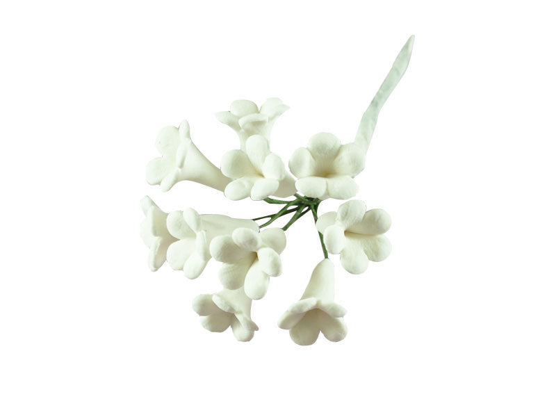 A bunch of white, realistic-looking gum paste flowers with bendable wires, against a white background.