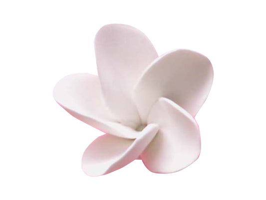 A large white sugar flower designed to resemble a frangipani, suitable for decorating cakes and cupcakes.