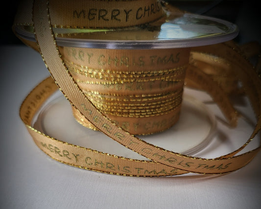 Gold Vandoros ribbon featuring elegant gold ‘Merry Christmas’ script, 10mm wide, premium Australian‑made ribbon suitable for cakes, gifts, and festive wrapping from The Sugar Smith.
