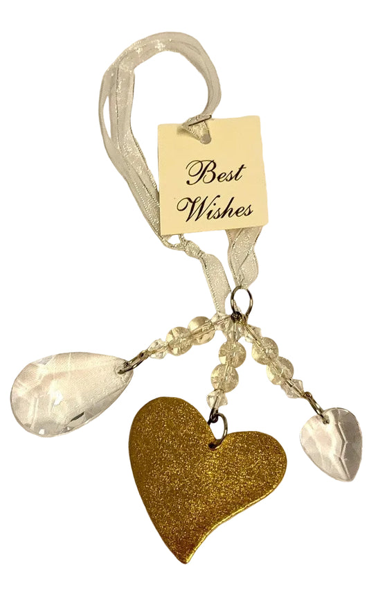 Gold hanging heart ornament made from hard cardboard with a clear plastic crystal and “Best Wishes” design, shown as a lightweight gift for a bride‑to‑be or window décor.