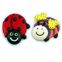 Set of 4 royal icing decorations — 2 ladybugs and 2 bumble bees, each approx 40mm high.