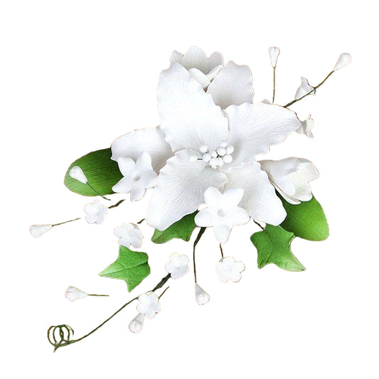 Artificial white flowers with green leaves on a white background