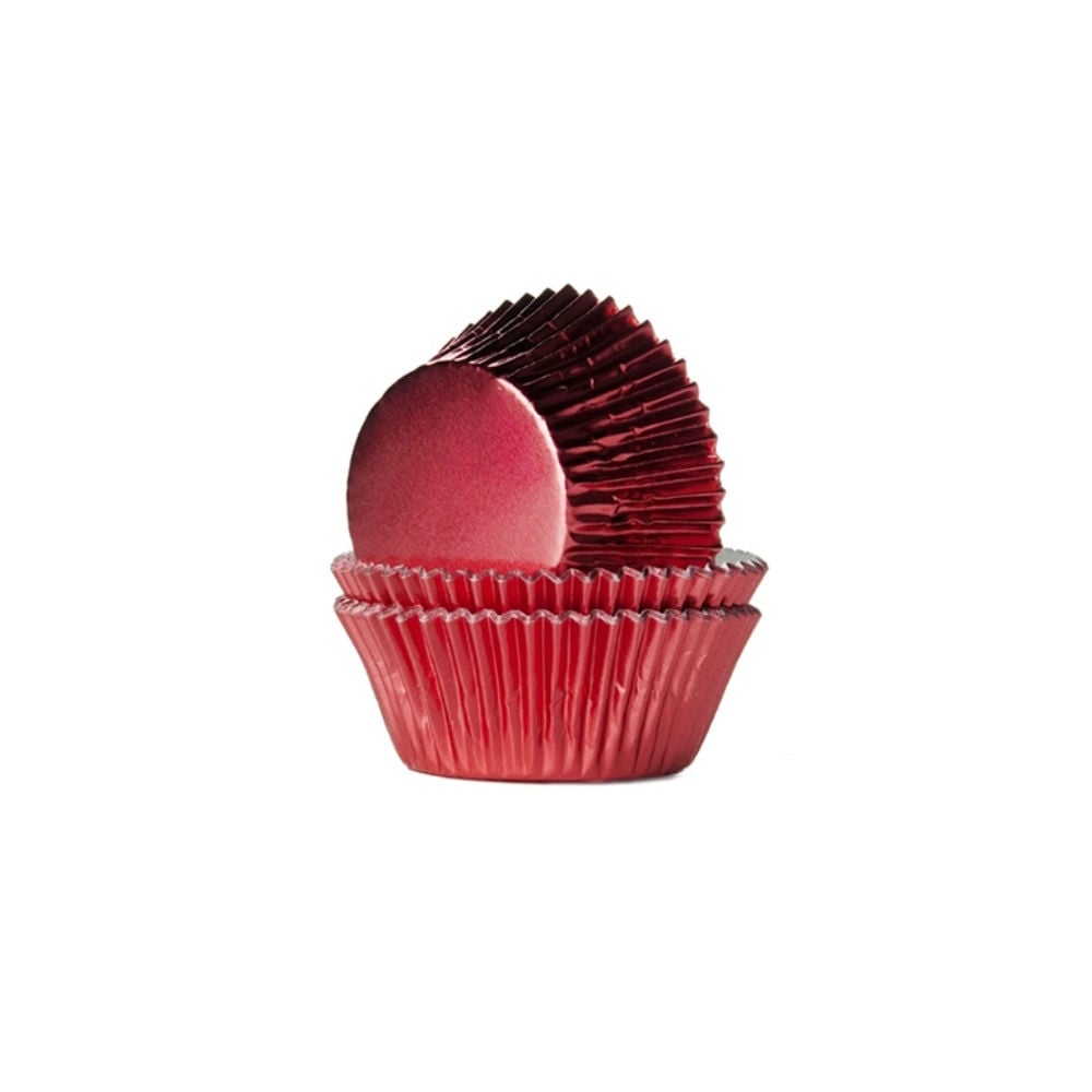 Stack of mini red foil cupcake cases with a 3cm base, used for baking small cupcakes and treats.