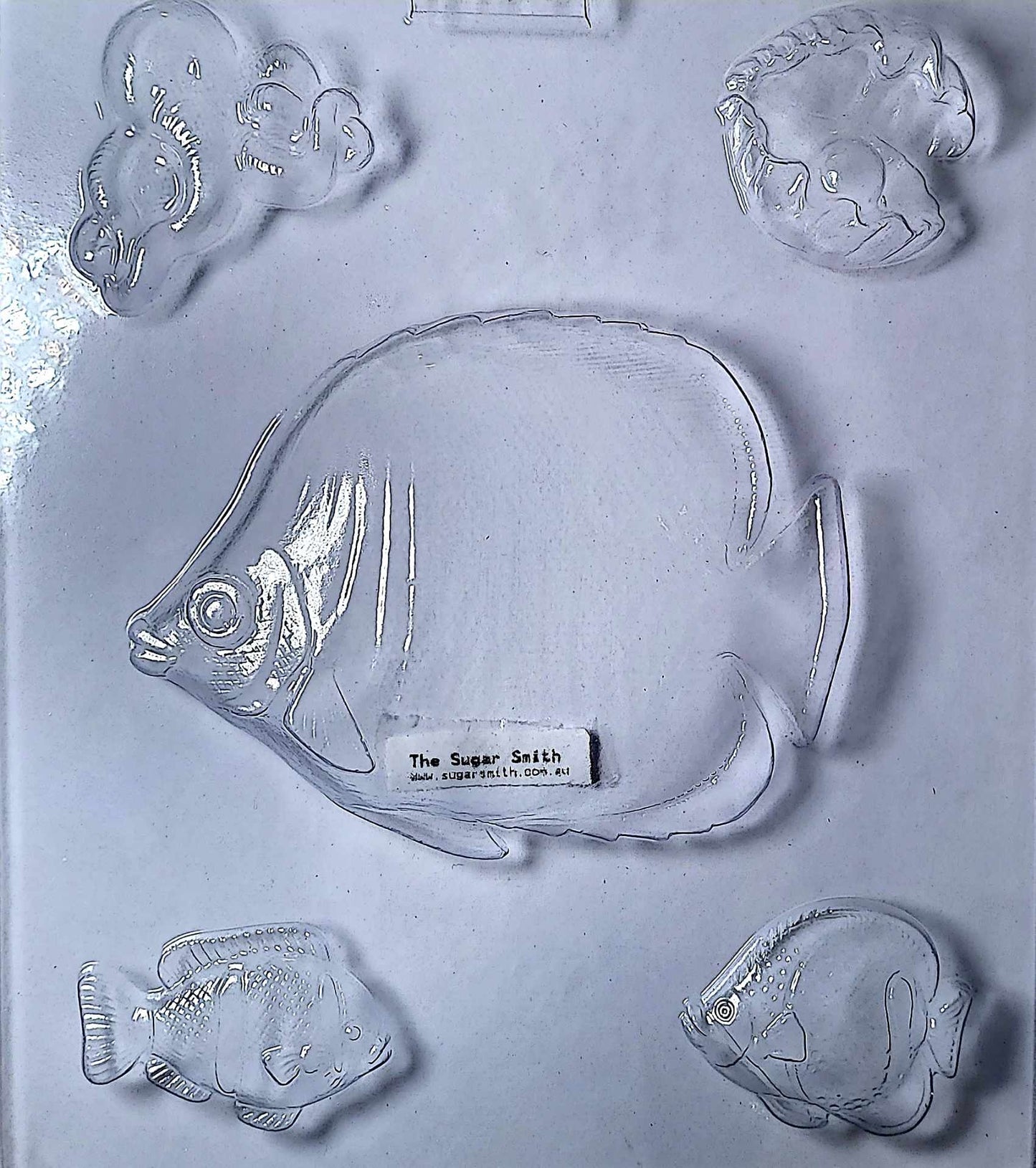 Dive into creativity with our Ocean Creatures Chocolate Mould, featuring a detailed fish, octopus, clam shell, and oyster design. Whether you're working with melted chocolate, fondant, or candy melts, this food-safe plastic mould delivers crisp, professional results every time.