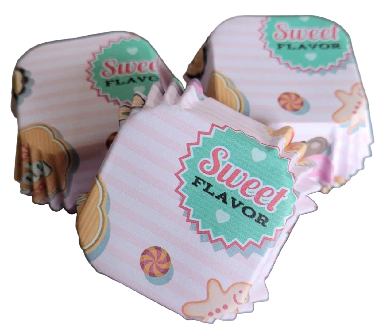 Square printed patty pan cases with pleated corners and a treat‑themed design.