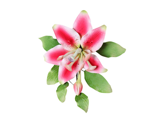 A wired Stargazer lily spray with pink petals and green leaves designed for cake decoration.