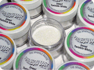 The Jewel Sparkle Range by Rainbow Dust is a fine dust with sparkling highlights that are the same colour as its main colour.  Rainbow Dust Jewel is classified as non-toxic, but it is not classed as a food item and are intended for use on items that can be easily removed and for decoration only.
The Jewel Rainbow Dust is part of Rainbow Dust Sparkle range which is a high sparkle non- toxic glitter range that is classified by FSA guidelines as 'Food Contact' Glitters.