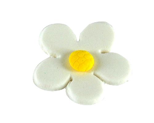 A white blossom with a yellow centre, made out of gum paste, designed for use as a cake decoration.