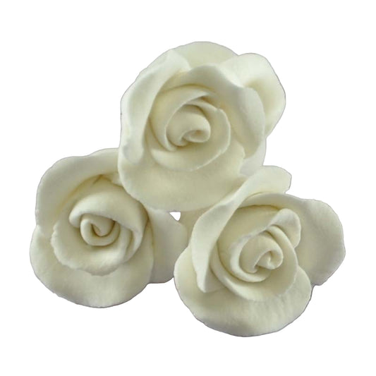 Three white miniature icing roses.