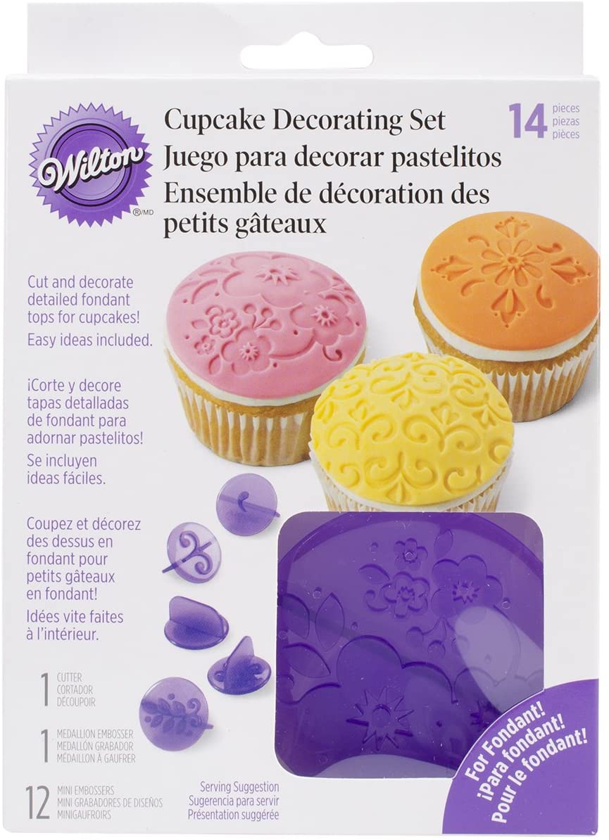 Cupcake decorating kit with tools for cutting and embossing fondant designs.